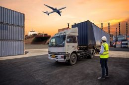 Foreman control loading Containers box to truck for Logistic Import Export Background, Business logistic concept, import and export concept.